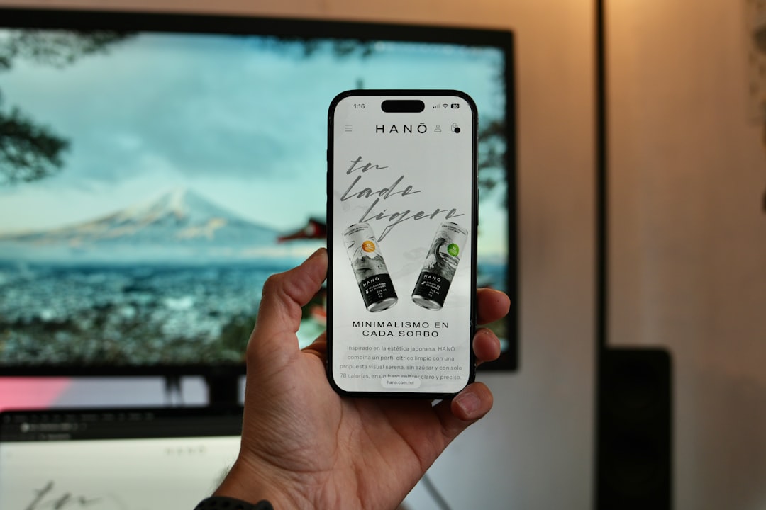 hand-holding-smartphone-displaying-website-with-drinks-nqndfvtohvm